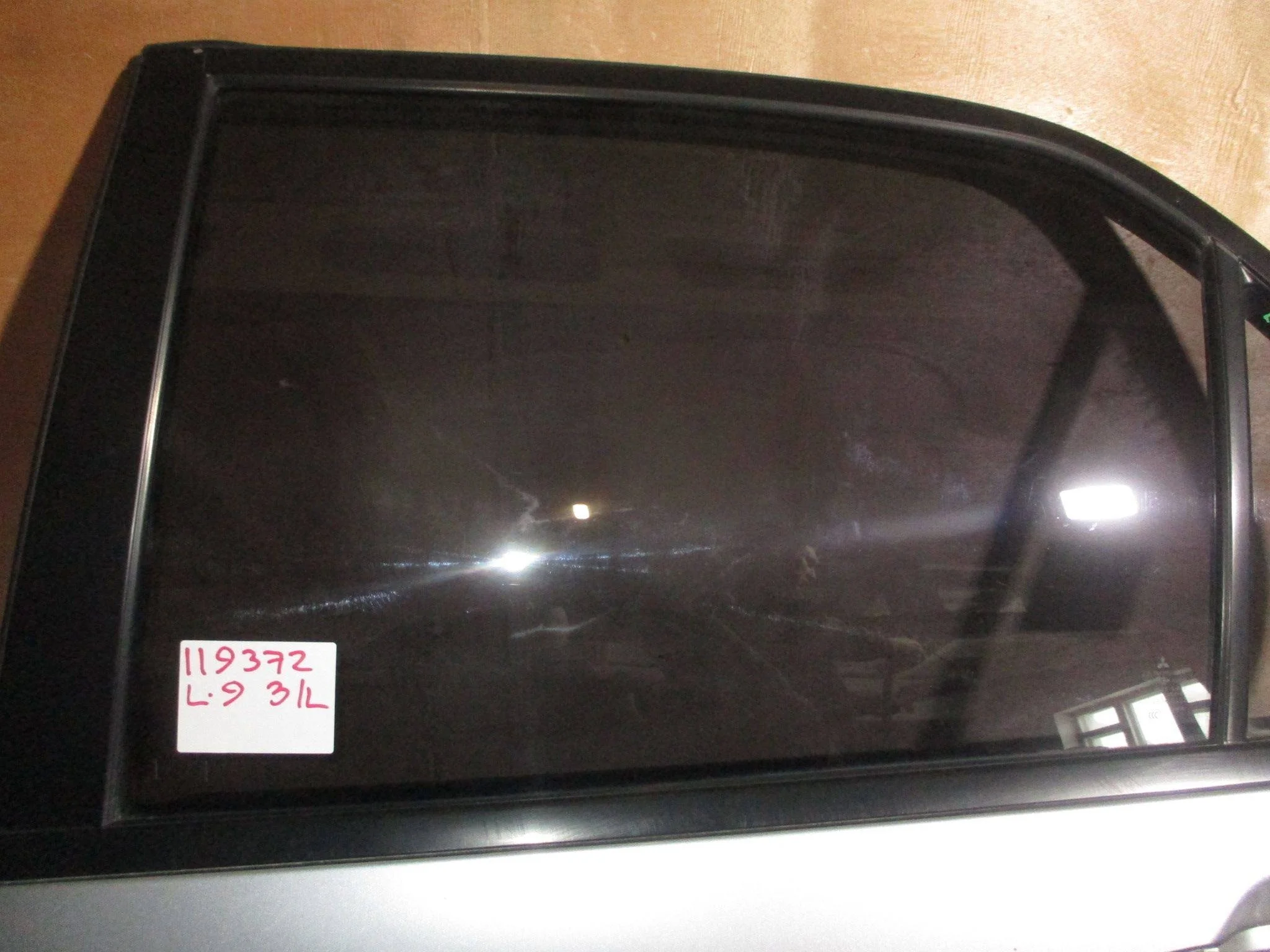 Стекло двери задней левой Mitsubishi Lancer 9 (CS) 2003-2006